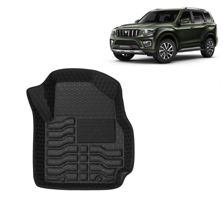 Heavy-duty black tray-shaped waterproof PVC car floor mats with raised protective side walls custom-fitted inside the footwell area of a premium utility vehicle.