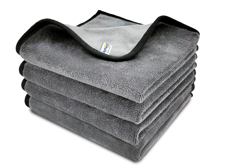 Stack of multi-colored Softspun 500 GSM ultra plush edgeless microfiber cloths for car drying