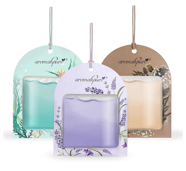 Aromahpure Gel Wink pack of three hanging car freshener pods with clear viewing windows showing purple lavender, brown musk, and blue ocean gels