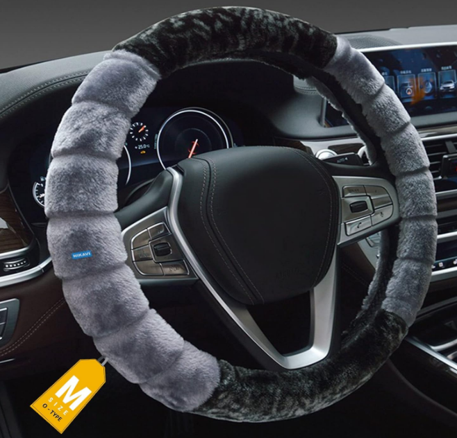 NIKAVI grey plush fur steering wheel cover designed for 38cm wheels showing its soft-touch texture and durable internal rubberized grip base.