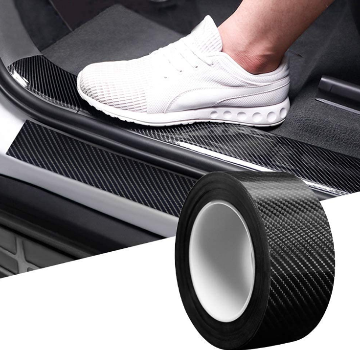 VINSU self-adhesive black carbon fiber door sill protector tape roll applied on car door step entry